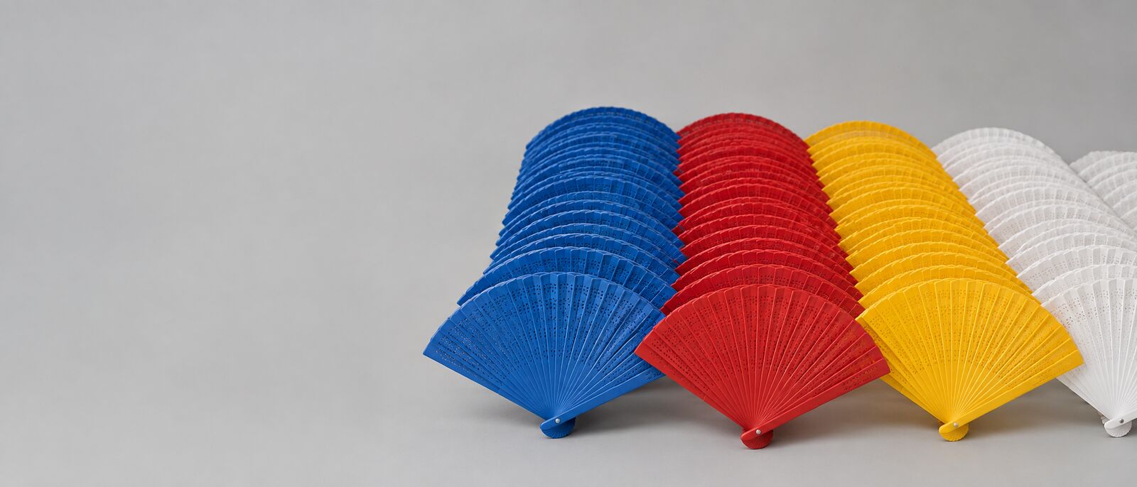 Custom printed plastic hand fans with a logo